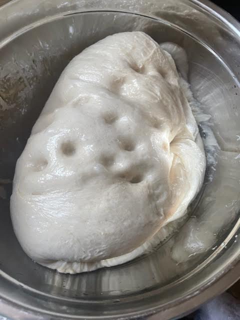 Softened dough in bowl 
