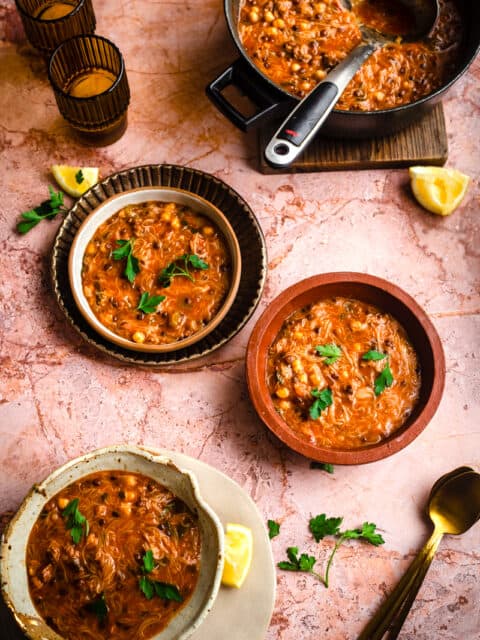 Pot of harira with 3 bowls