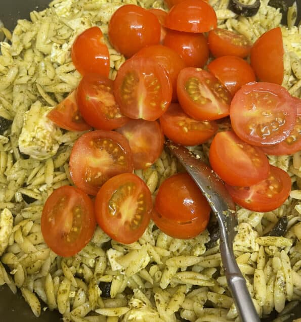 Orzo and tomatoes in a pot
