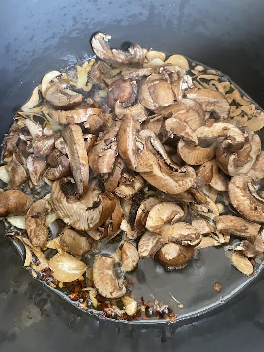Mushrooms added to pot