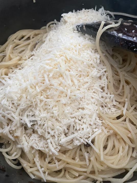 Parmesan added to pot