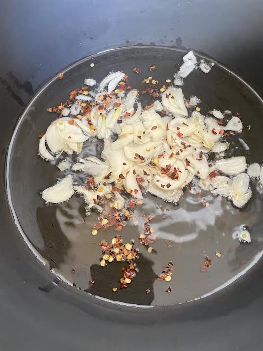 Oil, Garlic and Chilli Flakes in pot