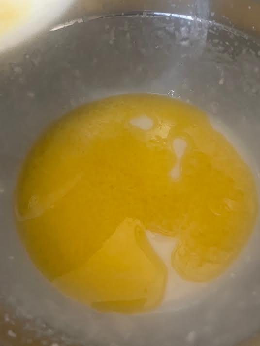 Melted butter in bowl
