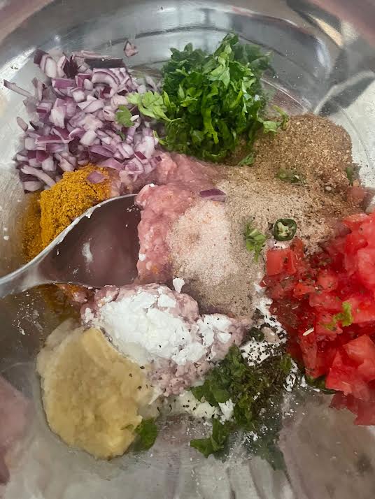 Chicken Chapli Kebab ingredients in a bowl