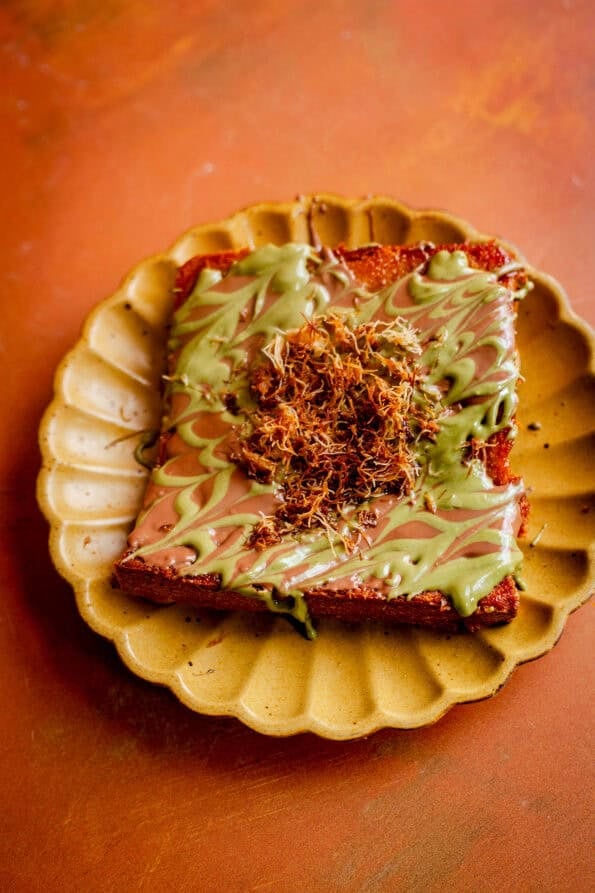 Honey butter toast with chocolate and pistachio topping