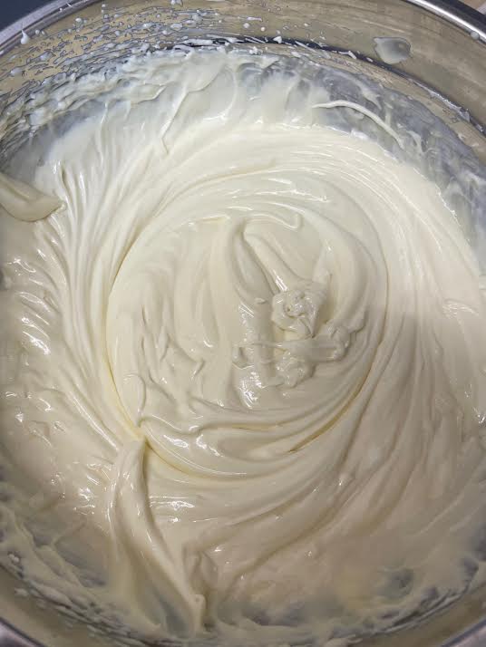Whipped cheesecake mixture in bowl