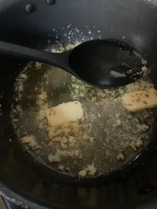 Garlic added to pot
