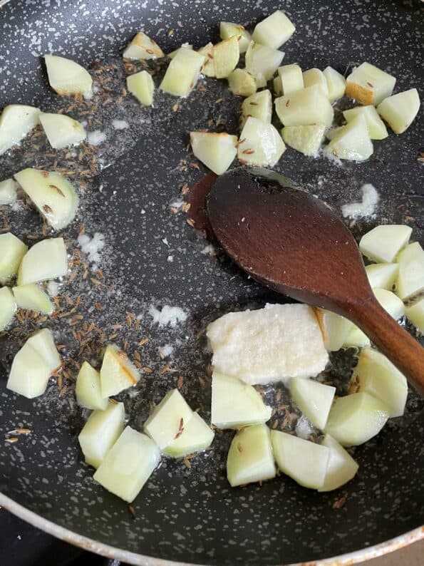 Garlic and Potato added to pan
