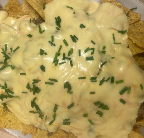 Cheese sauce on top of Tortillas