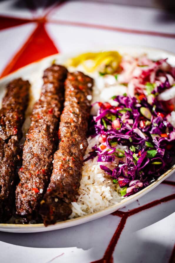 Kebabs, Rice and Salad in plate