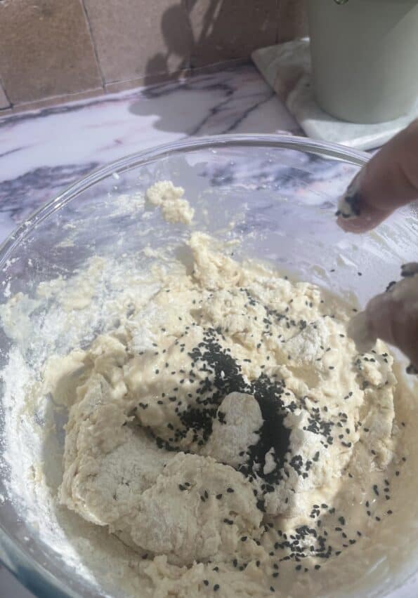 Black Seeds in bowl with Dough