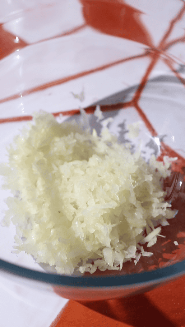 Grated Onions in bowl