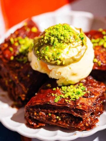 Turkish chocolate bakalva in plate with ice cream on top