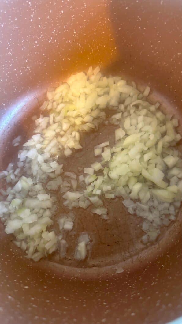 Shorbat Adas - Arabic (Middle Eastern) Lentil Soup Onions in pot