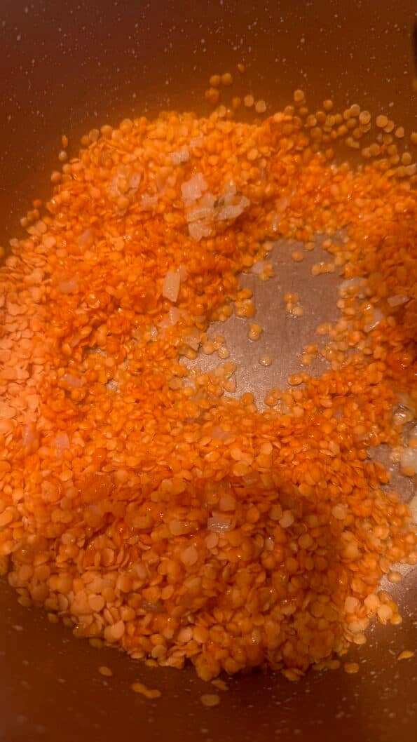 Shorbat Adas - Arabic (Middle Eastern) Lentil Soup Lemtils added to pot