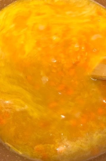 Lentils boiling in pot