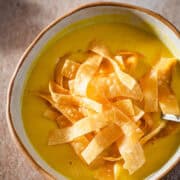 Shorbat adas with fried samosa leaves on top