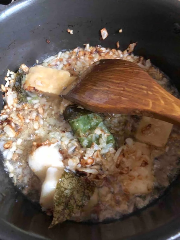 Garlic, Ginger and Green Chilli added to pot