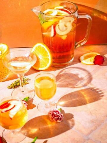 SAudi Champage in a jug with glasses around