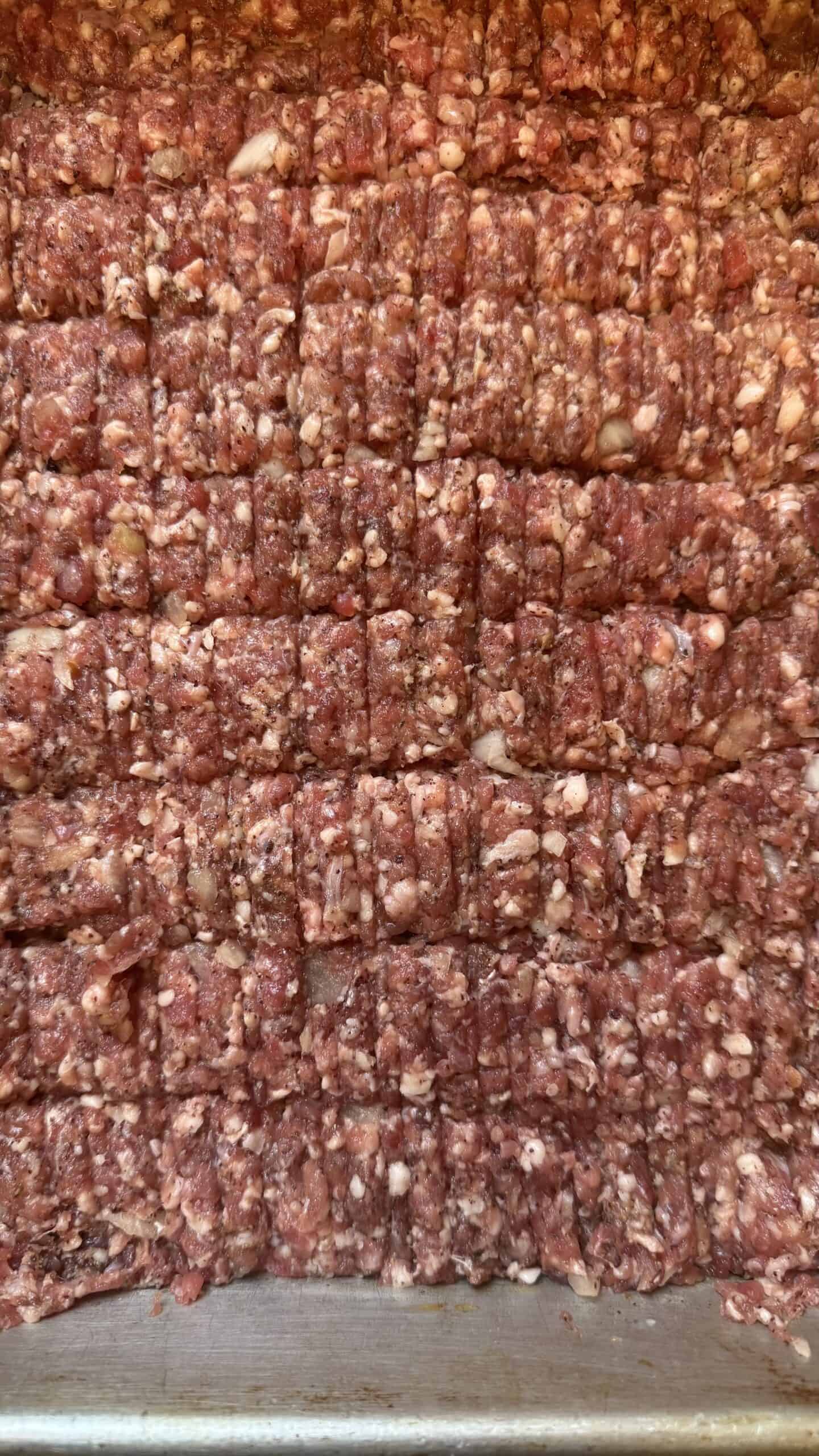 Kebab meat in pan with ridges