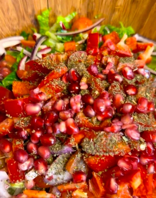 Pomegranate added to bowl