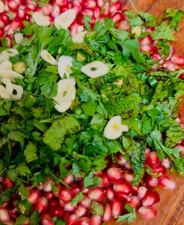 Garlic and Herbs added to salad
