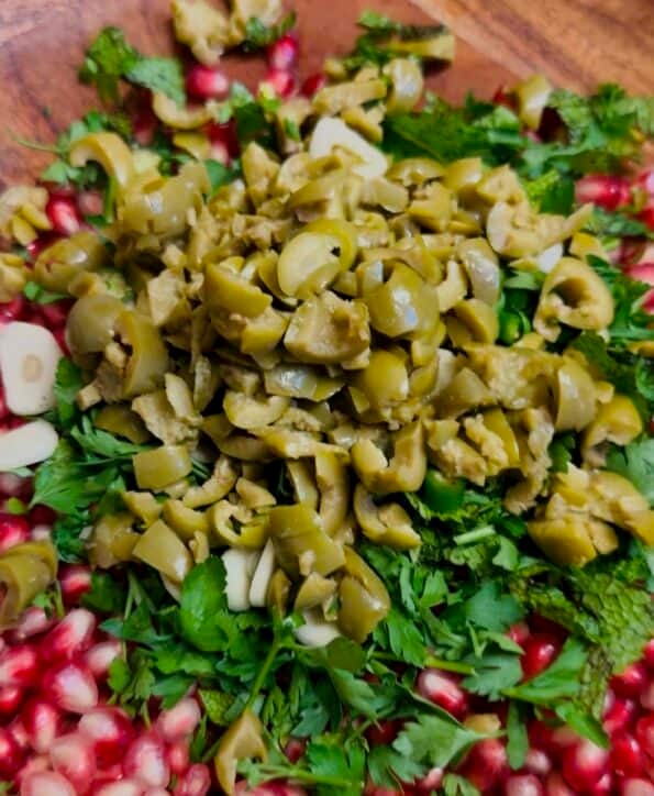 Olives added to bowl
