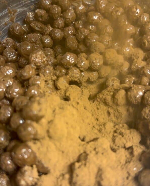 Cocoa powder added to bowl