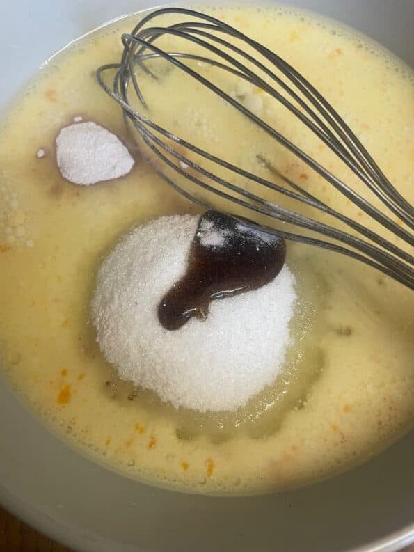 Sugar and vanilla added to dish