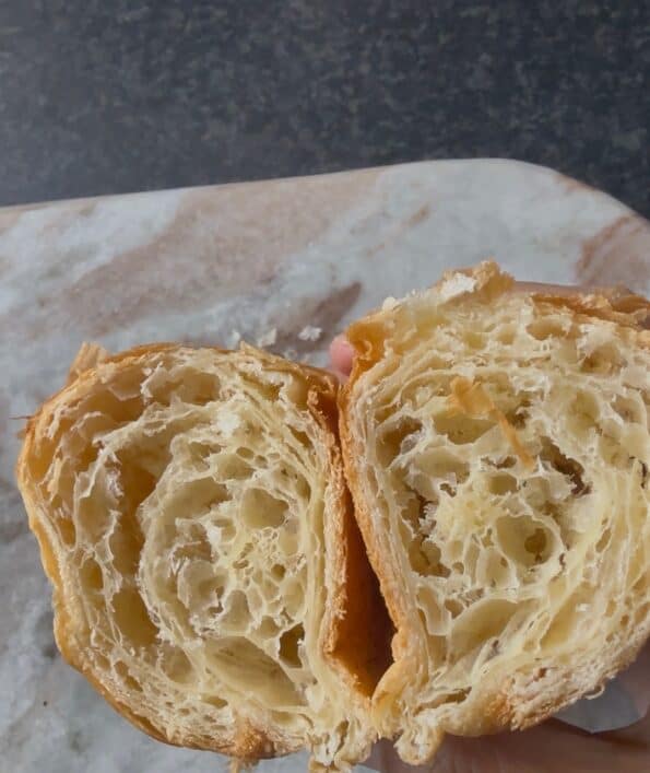 Croissant cut in half