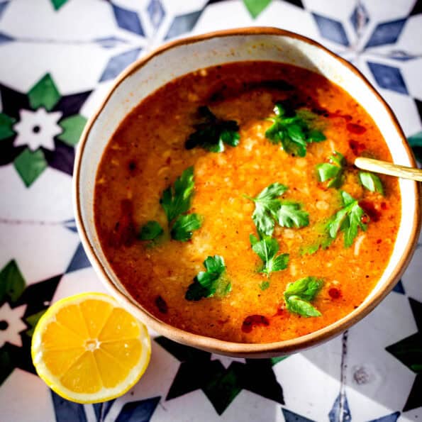 Ezogelin Soup in bowl with lemon to side