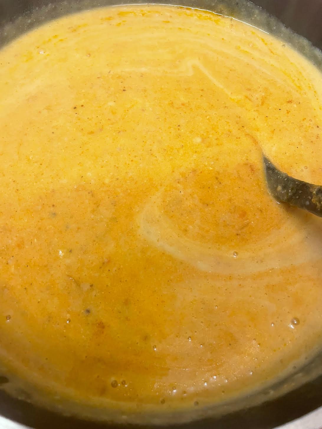 Authentic slow cooked Chicken Haleem Blended lentils in pot