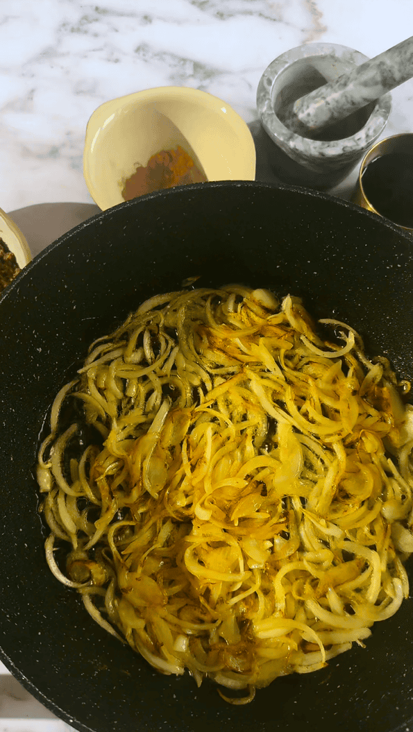 Fesenjan Recipe (Persian Chicken Stew) Golden onions in pan