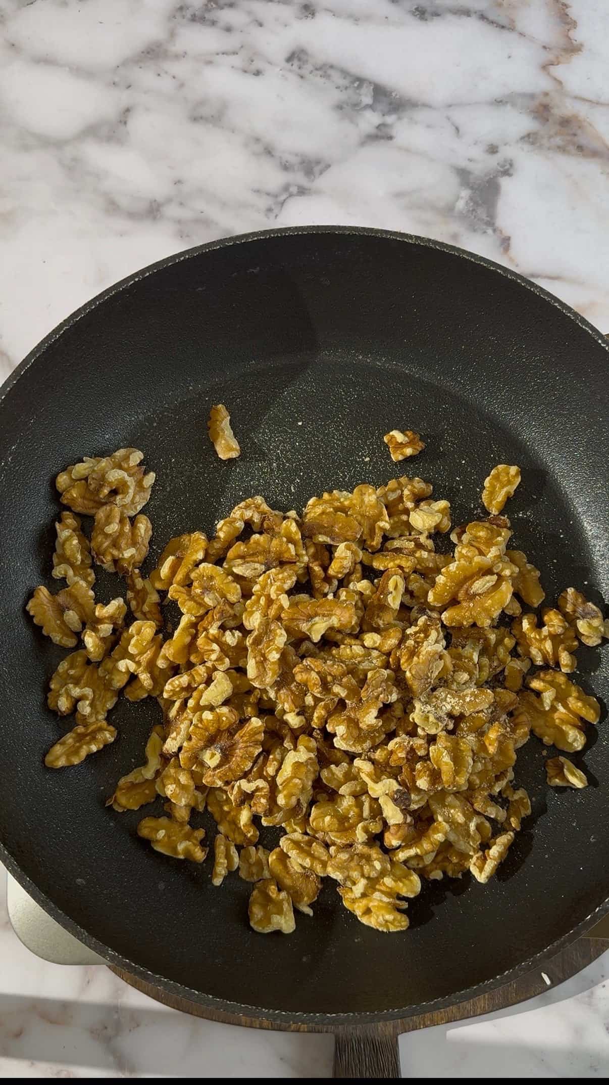 Fesenjan Recipe (Persian Chicken Stew) Walnuts in pan