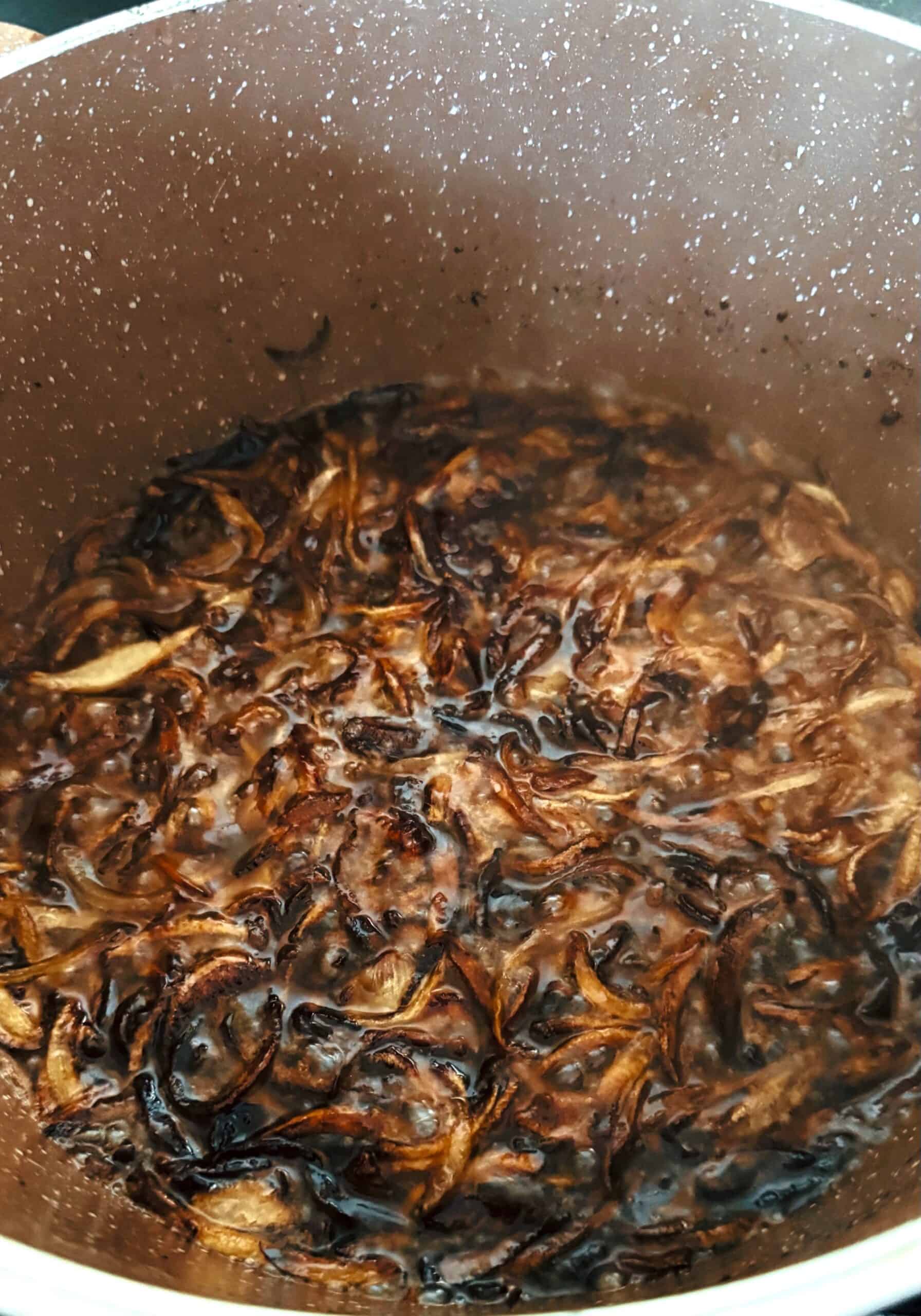 How To Make Mujadara Hamra (Authentic Lebanese Recipe) Browned onions in pot