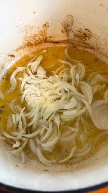 Authentic Pakistani Nihari (Slow-Cooked Lamb or Beef Nihari) Onions in pot