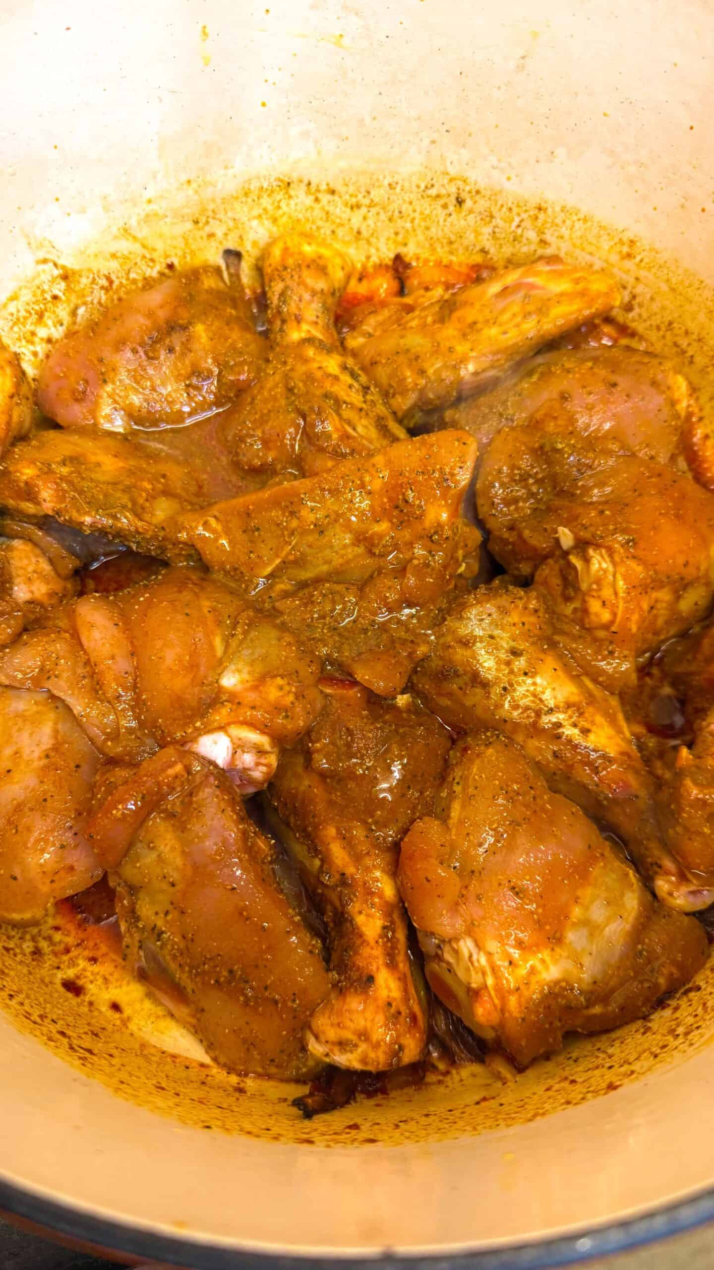 Moroccan Chicken with Preserved Lemon & Harissa Chicken added to pot