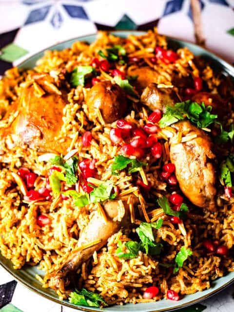 Kabsa in dish with toppings