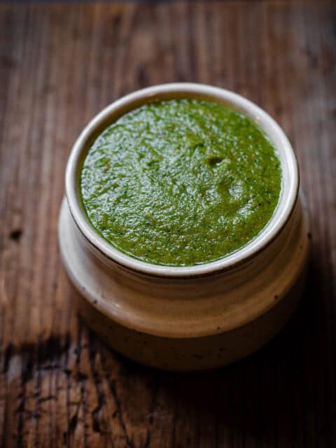 Zhug in bowl on table