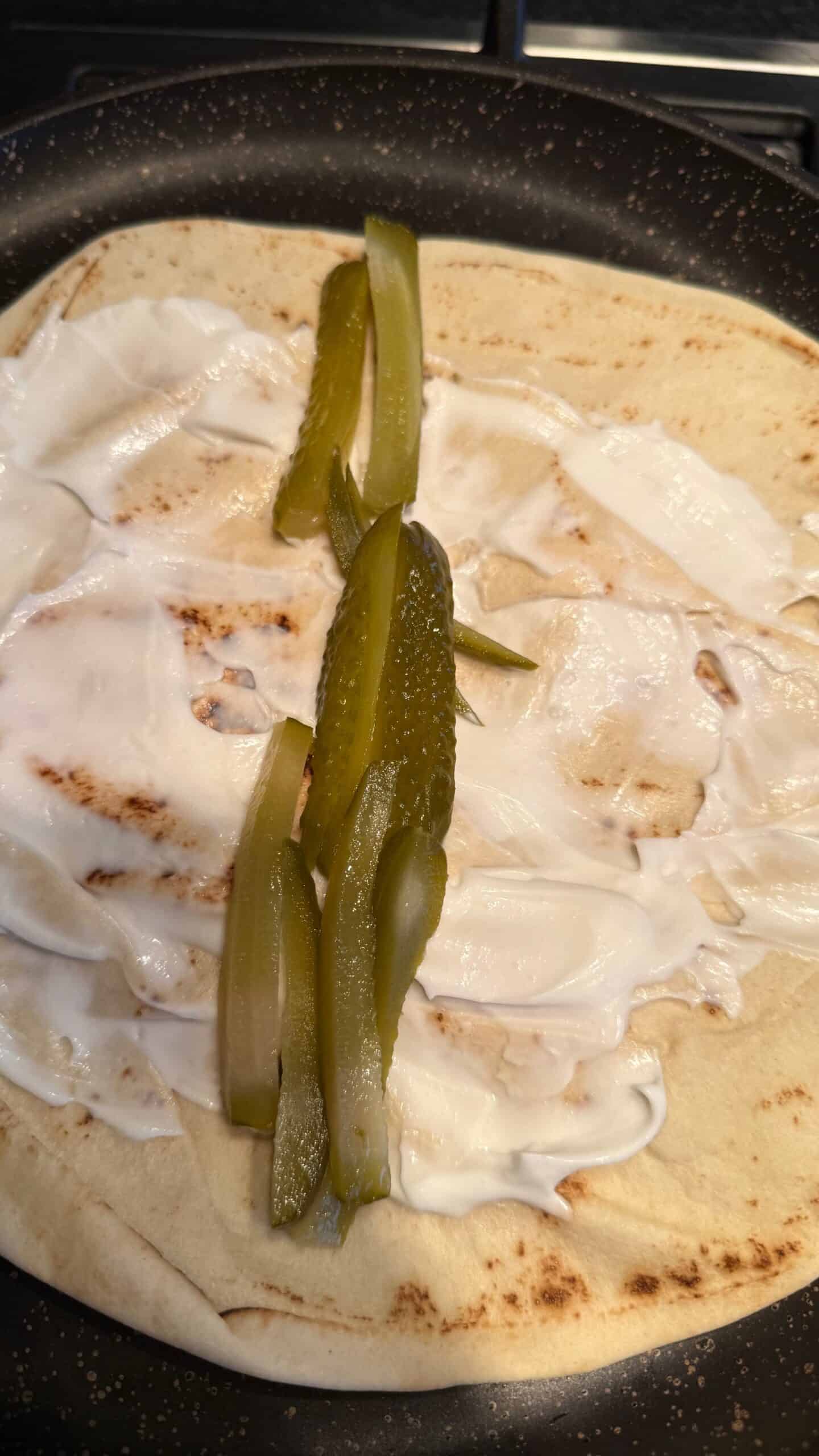 Crispy Chicken Shawarma Wrap with Toum and Pomegranate Molasses Pickles added to wrap