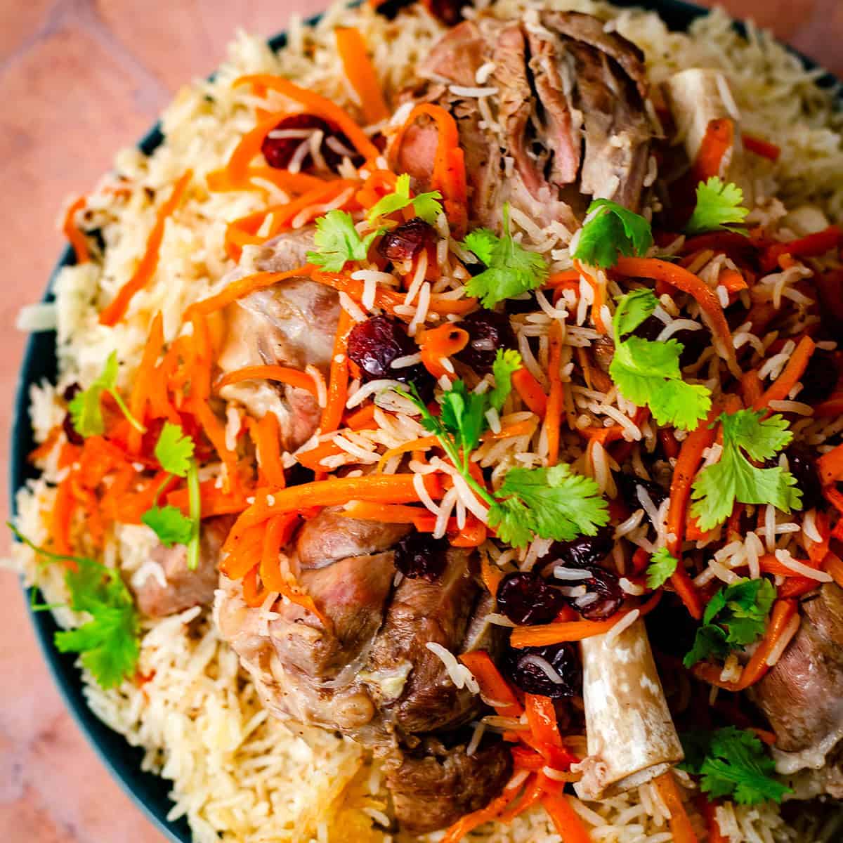 Qabuli Pulao - Afghan Lamb and Saffron Rice with Carrots and Raisins Qabuli Pulao in dish