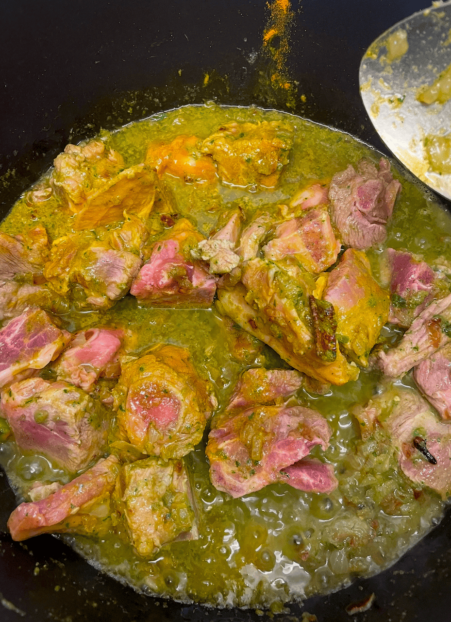 Memon Lamb (or Mutton) Akni Coriander and Green Chilli mixture added to pot