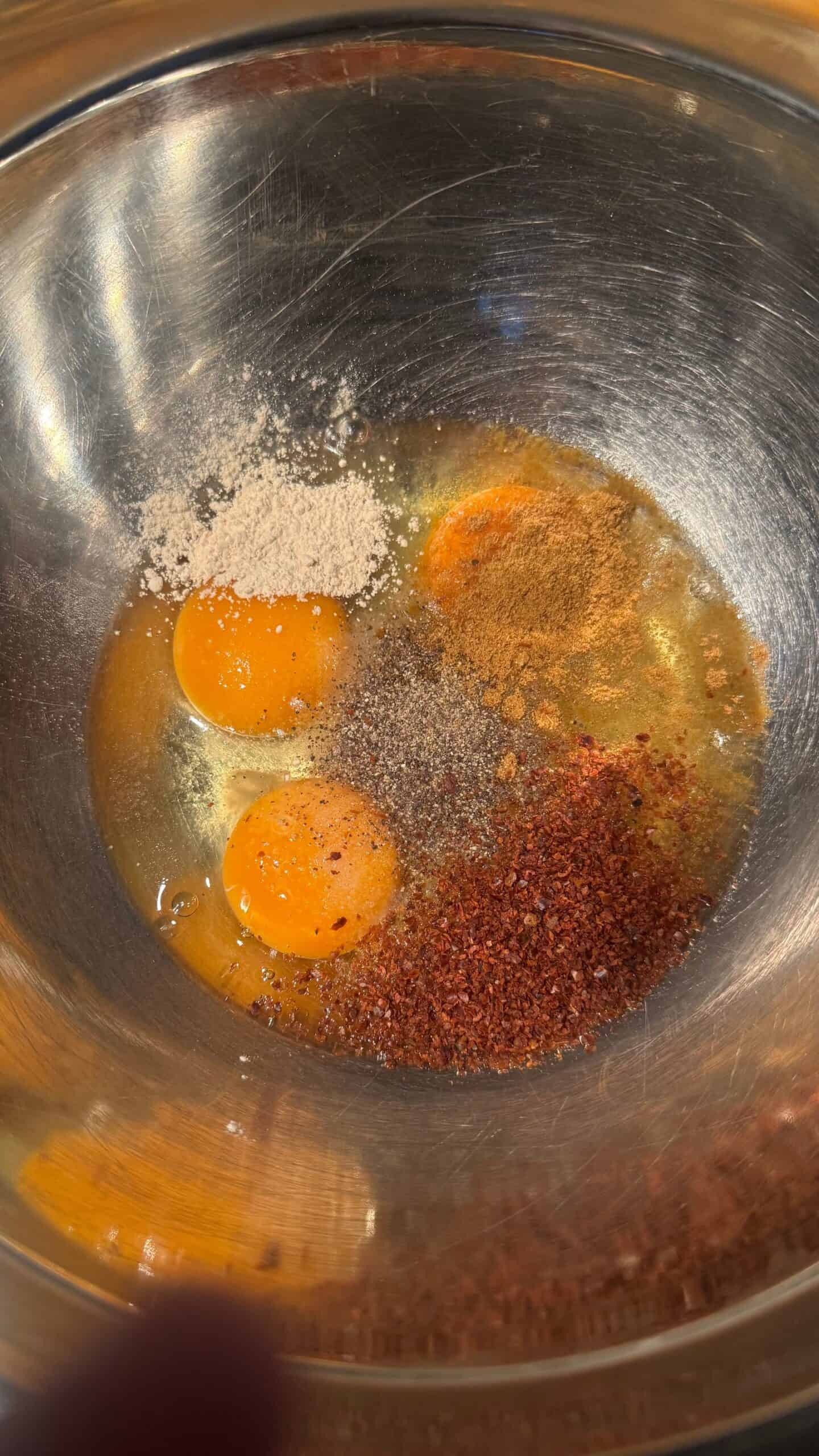 Turkish French Toast (Yumurtalı Ekmek) Eggs and spices in bowl