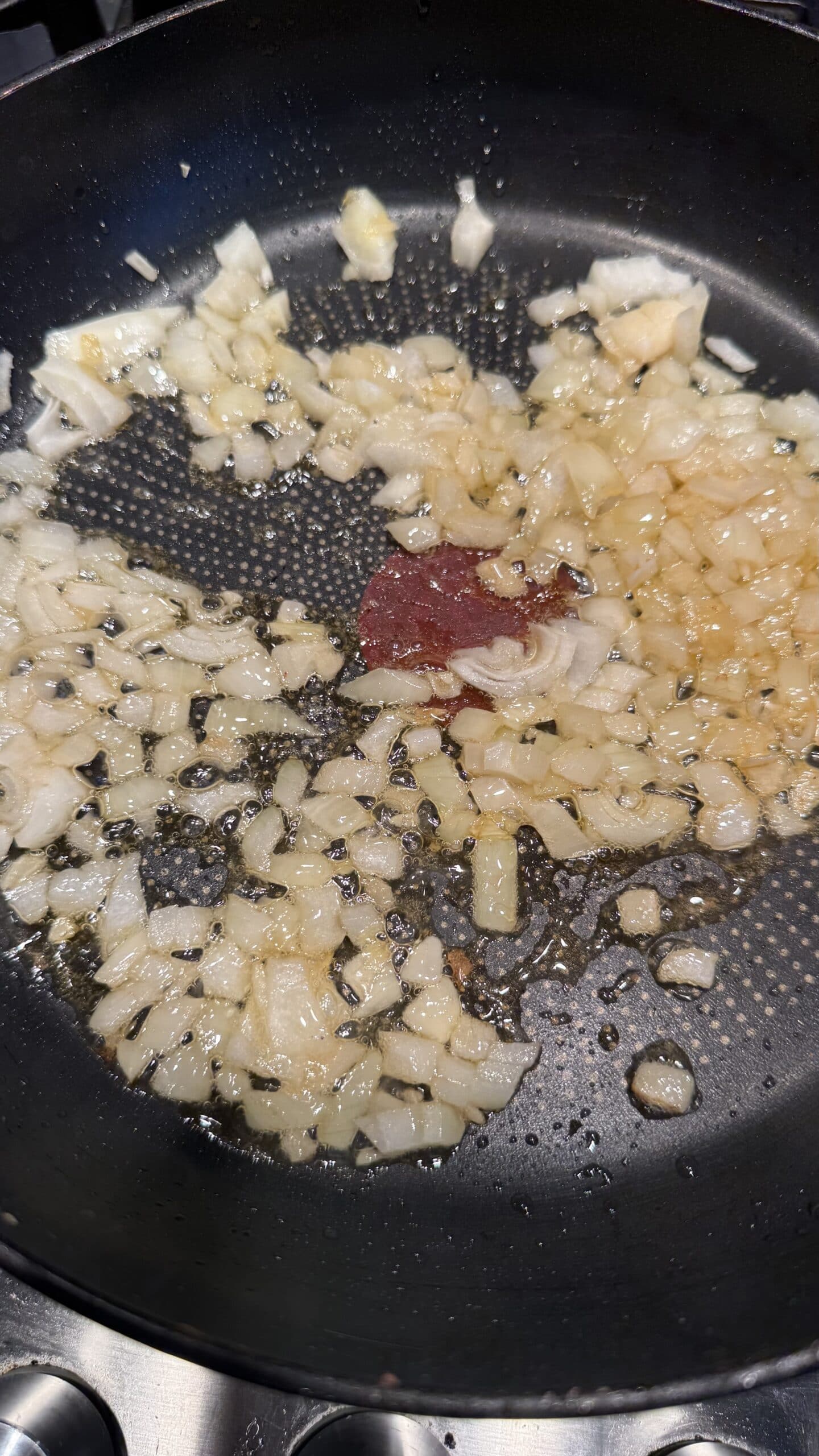 Lebanese Batata w Bayd – Potatoes and Eggs Onions and Oil in pan