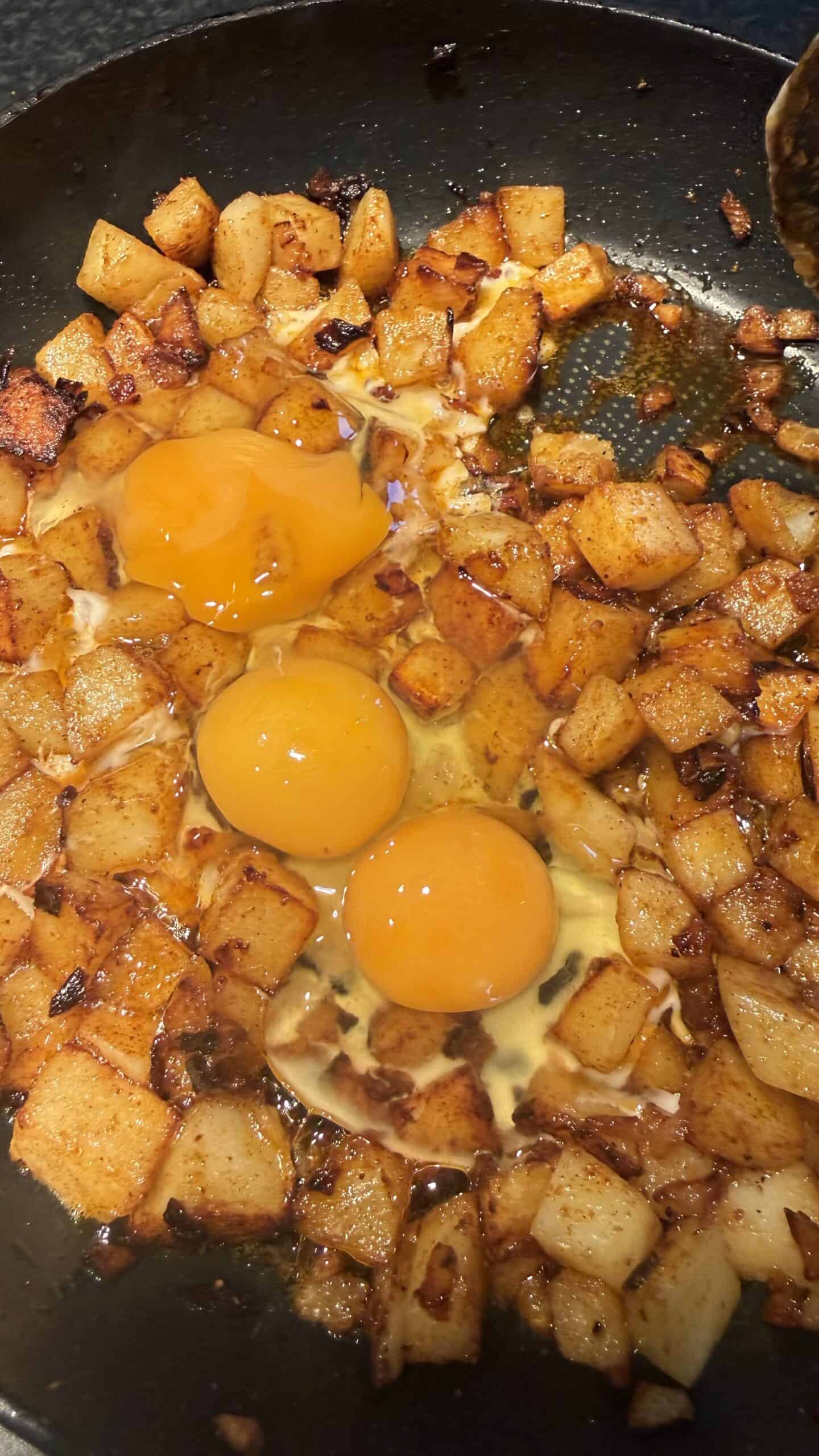 Lebanese Batata w Bayd – Potatoes and Eggs Eggs added to pan