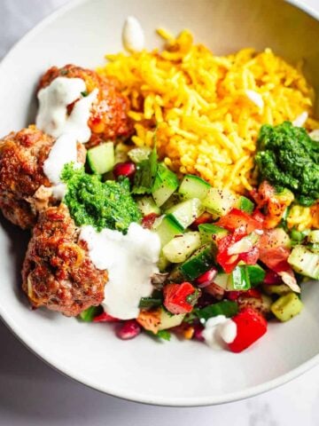 Kofte with salad and rice in bowl
