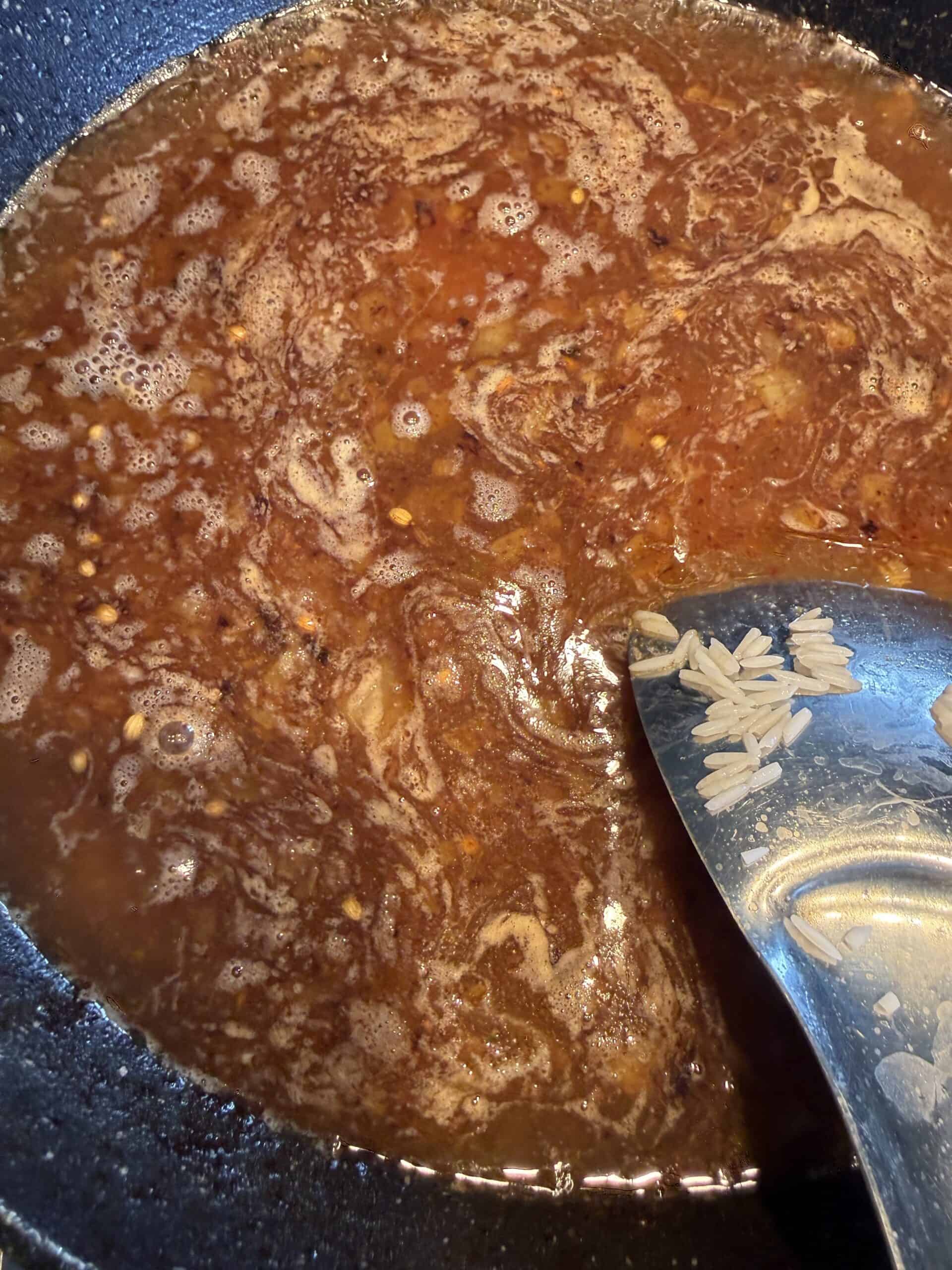 One Pot Seekh Kebab Meatballs and Pulao RIce added to pot