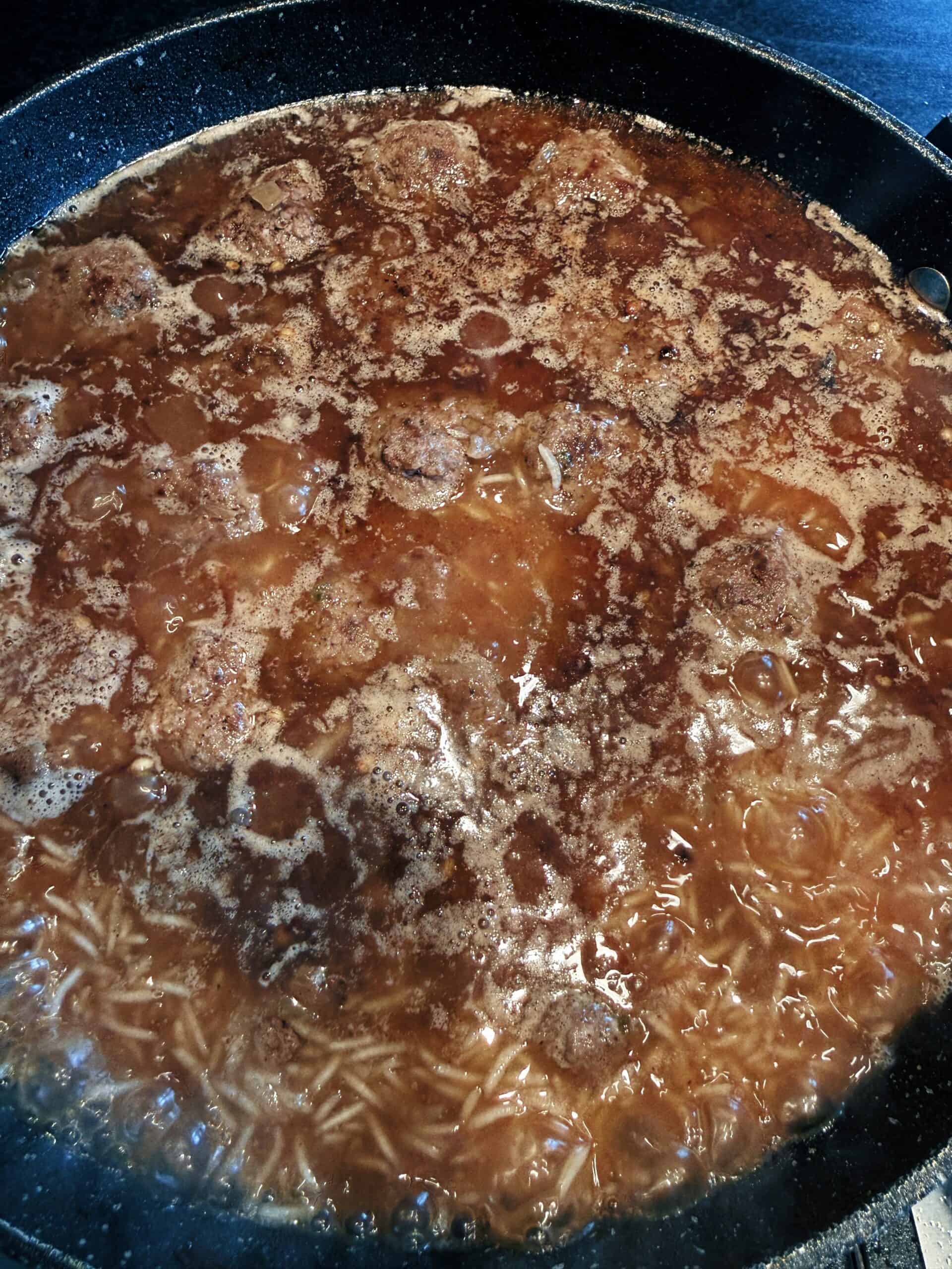 One Pot Seekh Kebab Meatballs and Pulao Meatballs added to pot