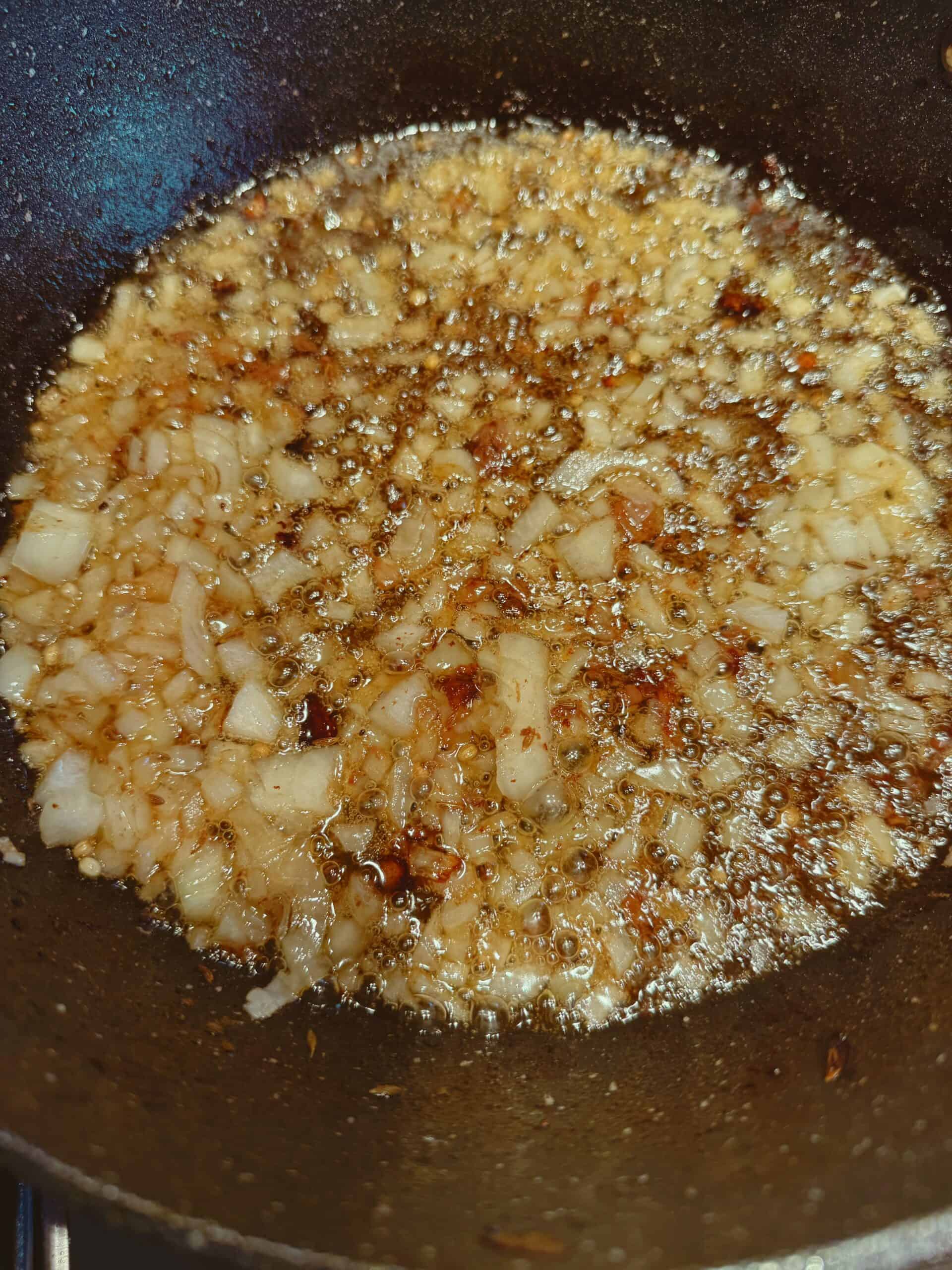 One Pot Seekh Kebab Meatballs and Pulao Onions and Spices in pot