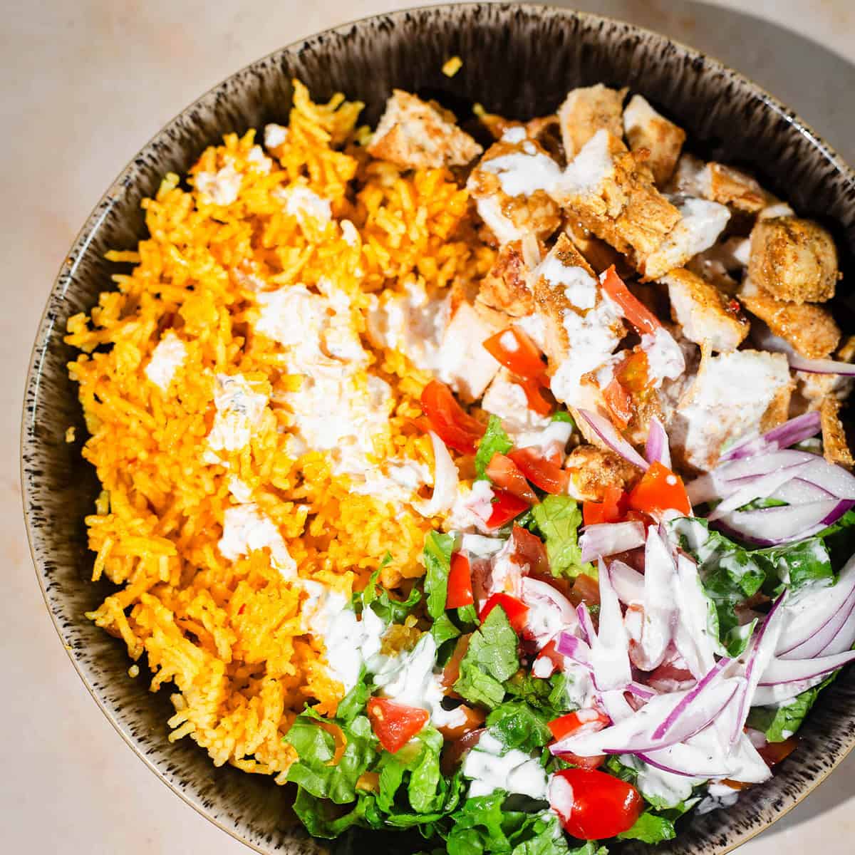 Chicken Shawarma Rice Bowls (Halal Cart Style) Chicken Shawarma Bowl on table
